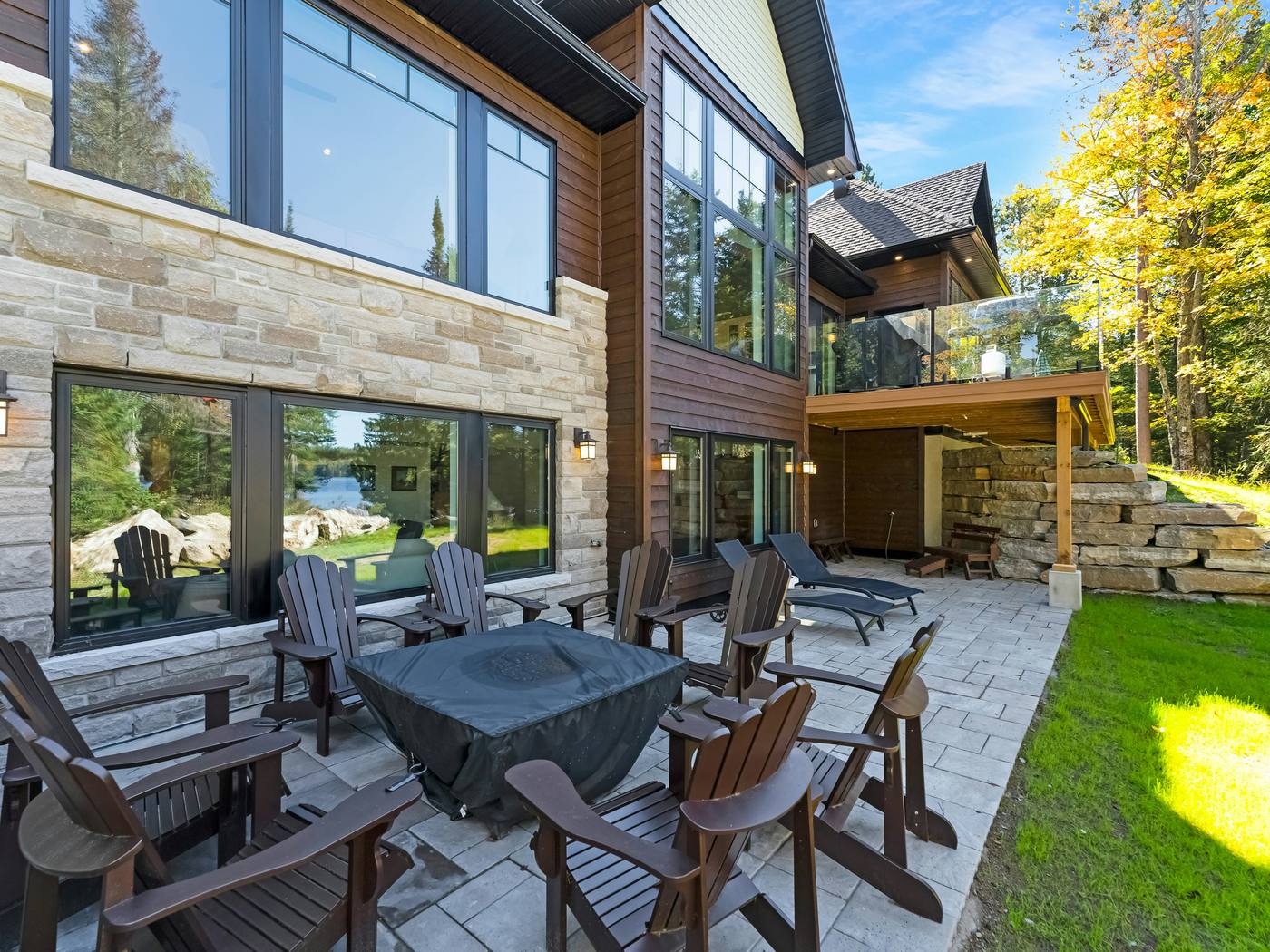 **Briar Hill** · A stone patio and boulder wall where the lawn kept washing out.